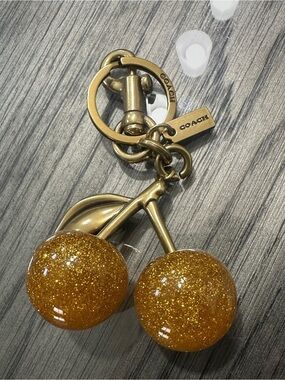 Coach Gold-Tone Glitter Cherry Keychain